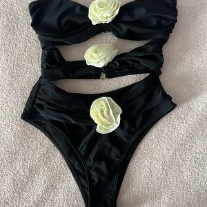 NWOT Elegant Black One Piece with Floral Accent